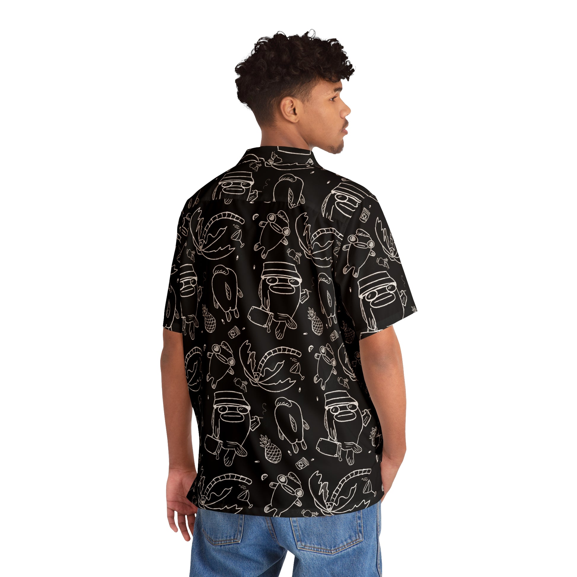 back view of a Hawaiian man wearing a Psychedelic Button Up Dress Shirt, black shirt with white line work illustrations of fish in Fear and Loathing commemorative style on the beach