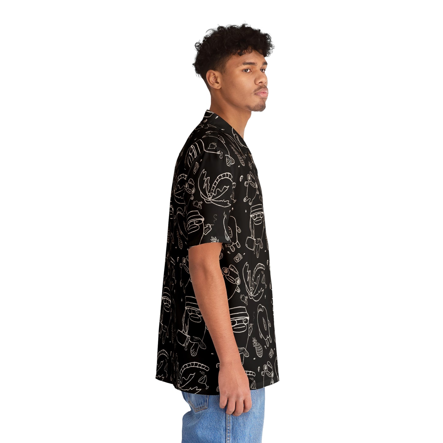 Hawaiian man wearing aPsychedelic Button Up Dress Shirt, black shirt with white line work illustrations of fish in Fear and Loathing commemorative style on the beach