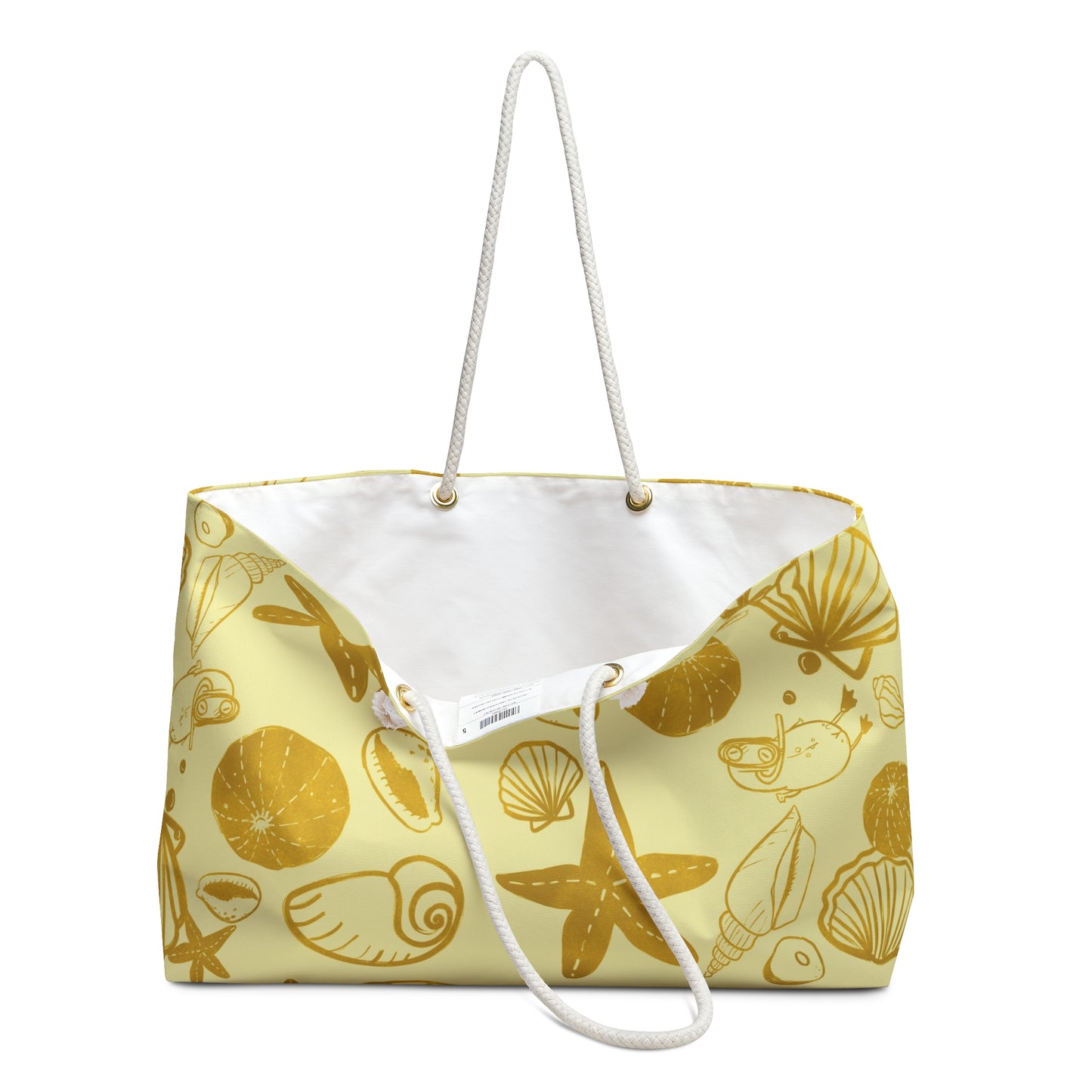 inside view of a large beach bag with vintage yellow print of sea shells and a surfjoy frog character diving 