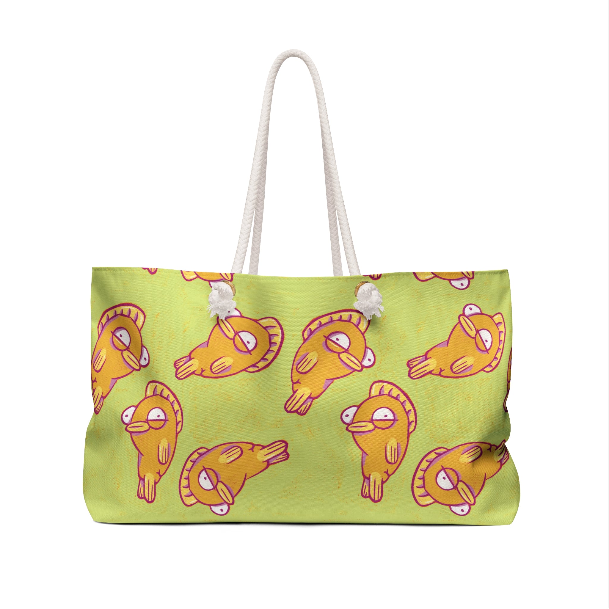 Tote bag with yellow fish pattern on a green background