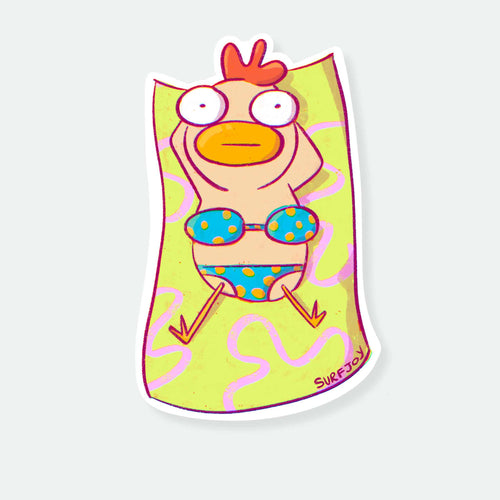 A die-cut sticker featuring a cartoon chicken character wearing blue polka-dot swim suit lying on a bright yellow towel with pink wavy lines. The sticker is shown on a light gray background.