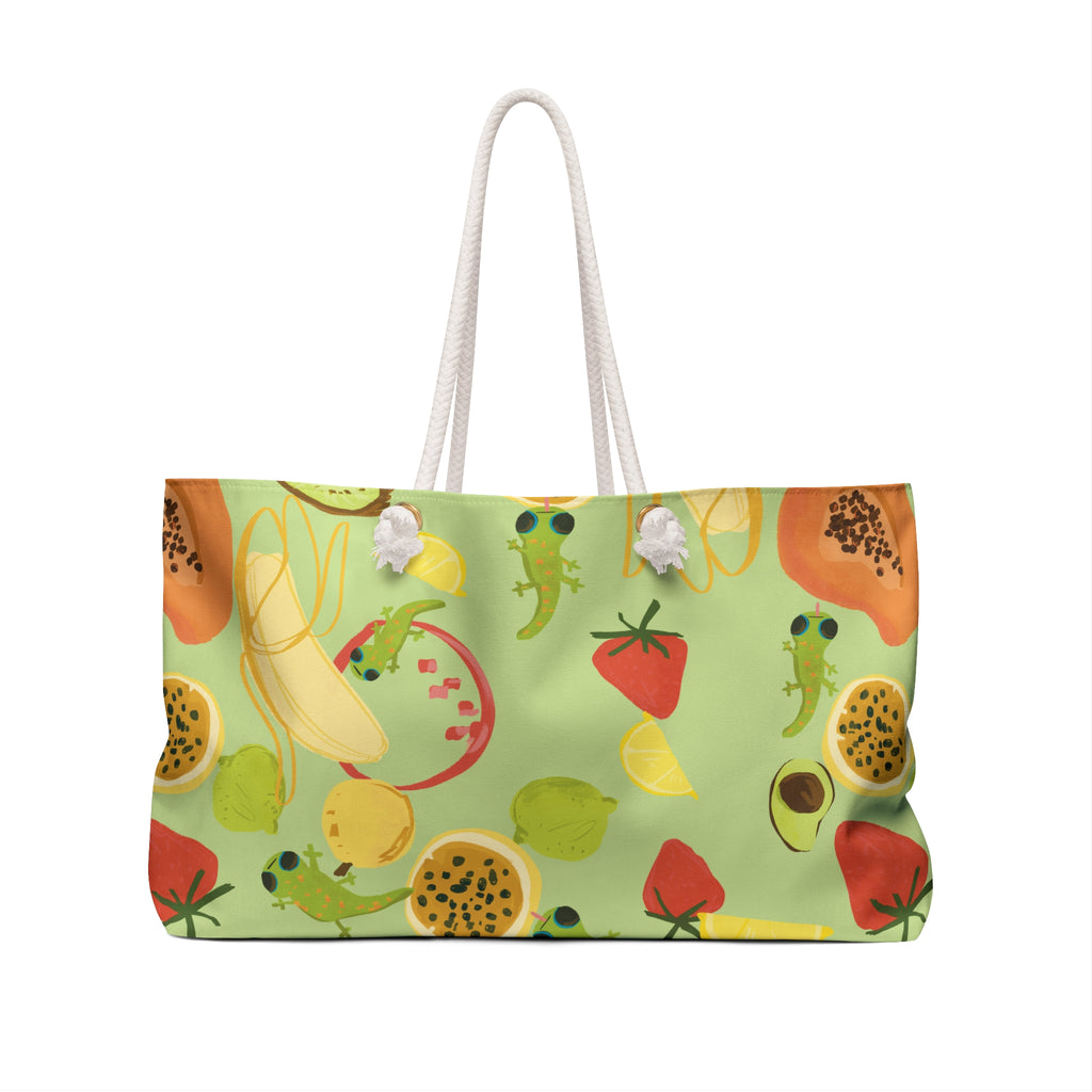 back view of a cute lime green oversized beach bag with a tropical fruits and gecko pattern