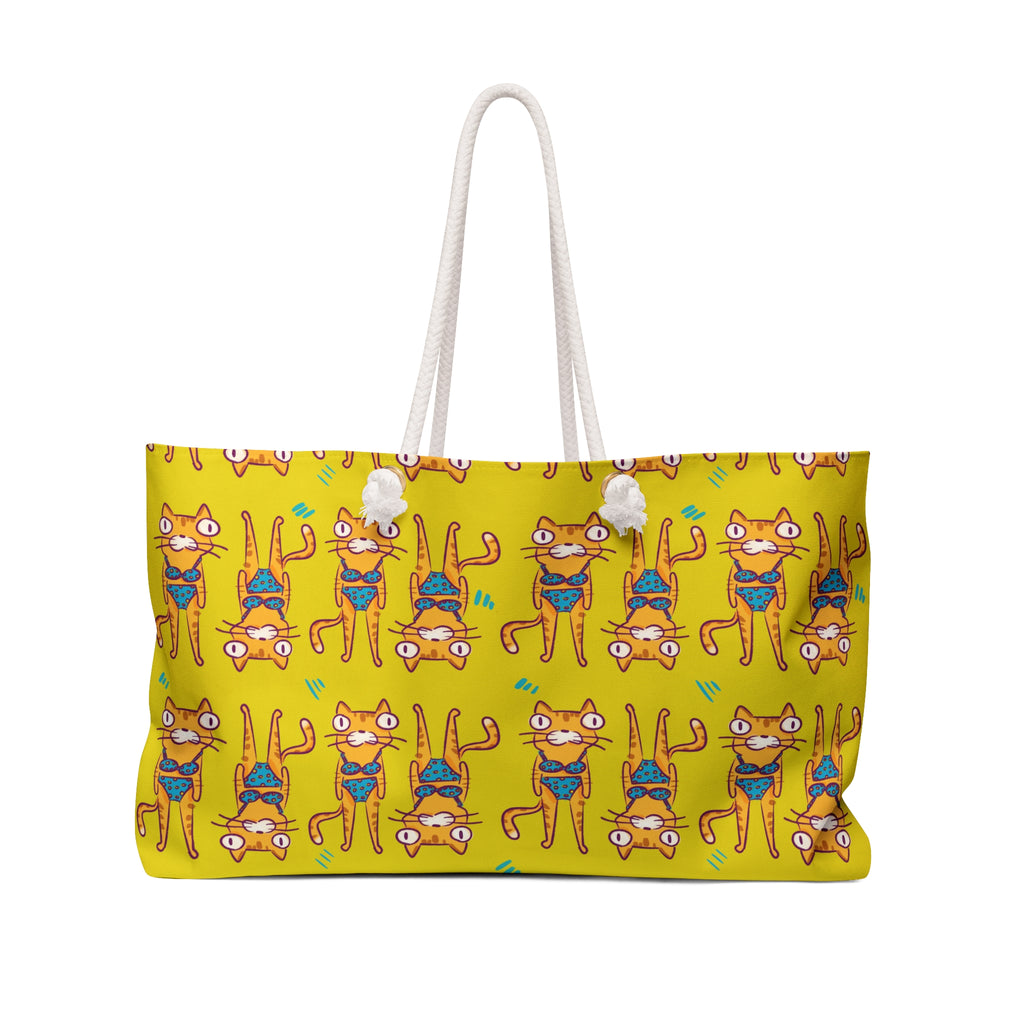 Yellow tote bag with cat pattern on a white background