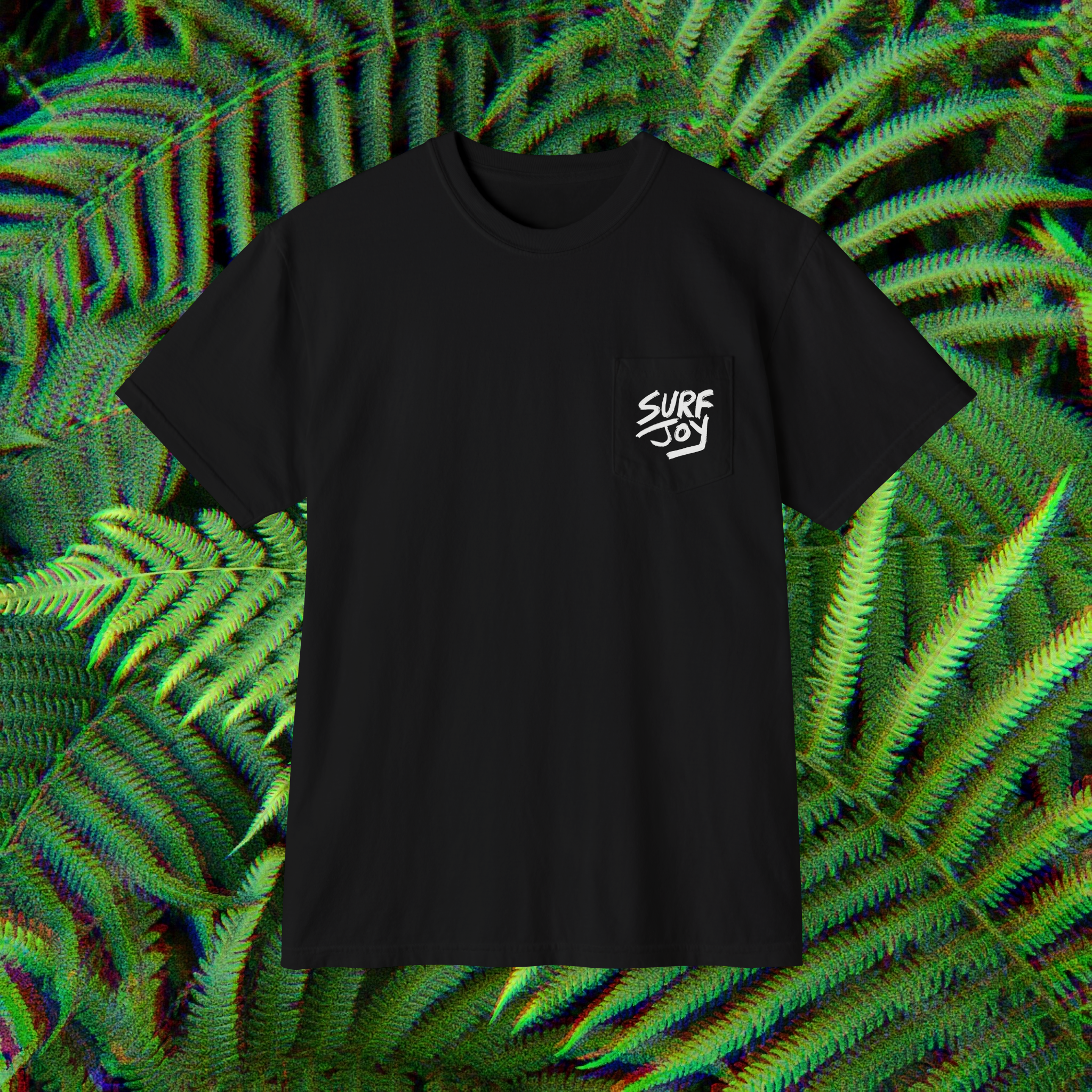 front view of a black surfjoy t-shirt featuring a design of a frog catching an air on a wave with a speech bubble that says 'rippit'