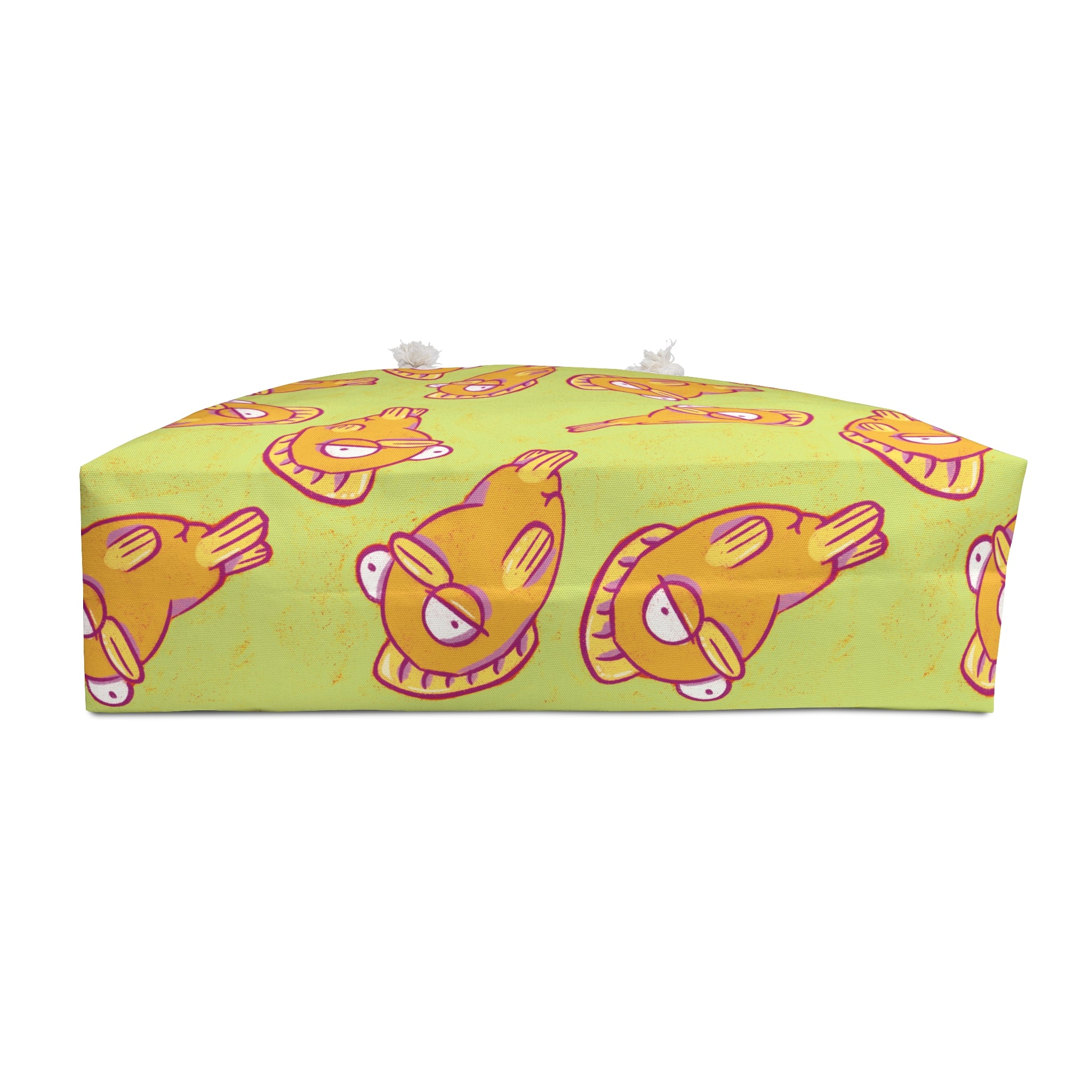 beach tote with a colorful illustrated fish pattern on a green background
