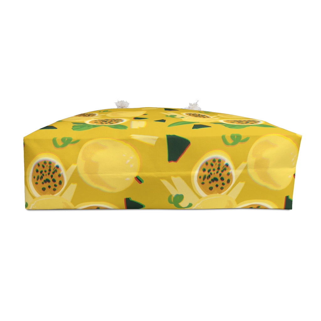 bottom of yellow beach bag with playful lilikoi pattern