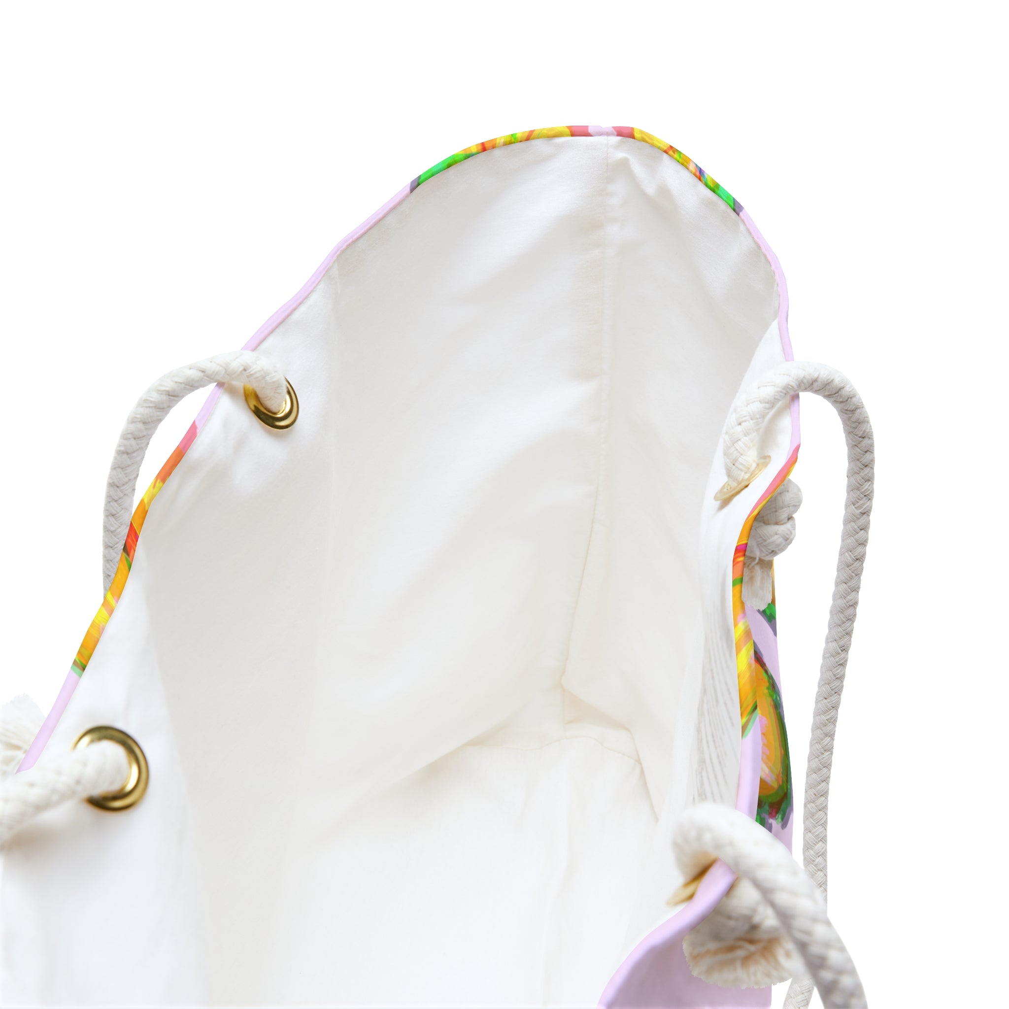 view of inside of hibiscus pattern beach bag showing the cream colored liner