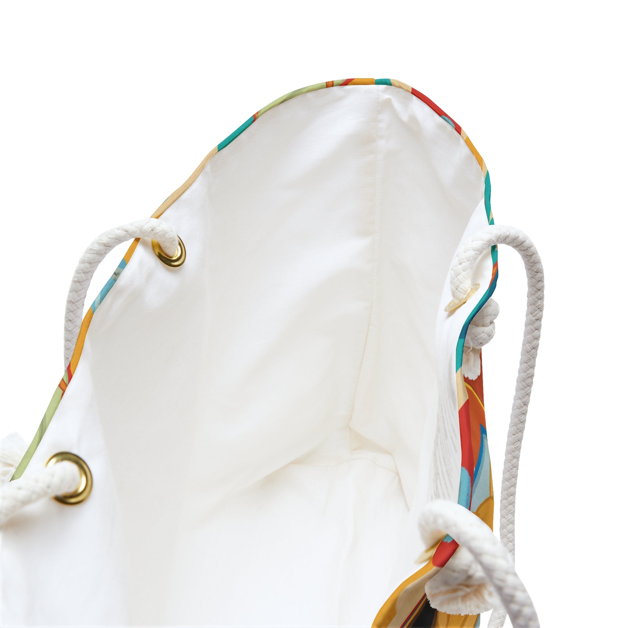 inside view of an oversized beach bag with a groovy all over print of cute fish characters on the beach