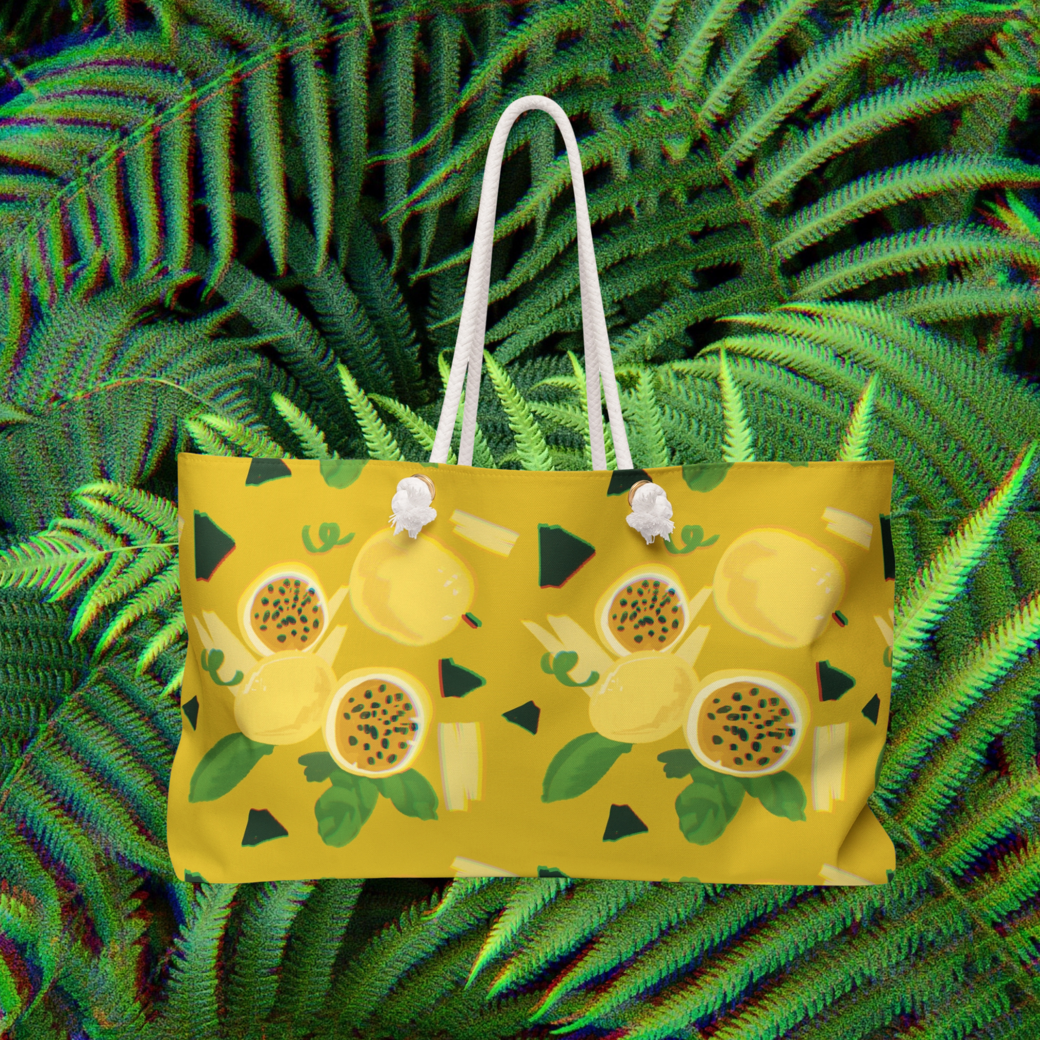 Yellow beach bag with a hawaiian lilikoi pattern on a green leaf background