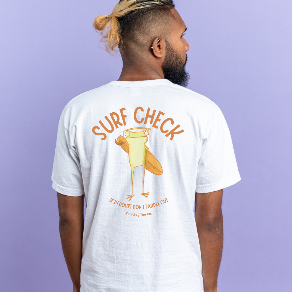man wearing surfjoy surf check t-shirt over a purple background