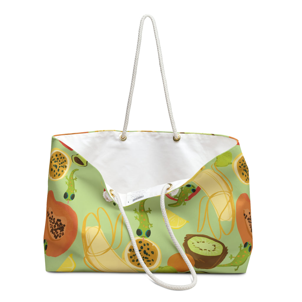 open beach bag view of a cute lime green oversized beach bag with a tropical fruits and gecko pattern