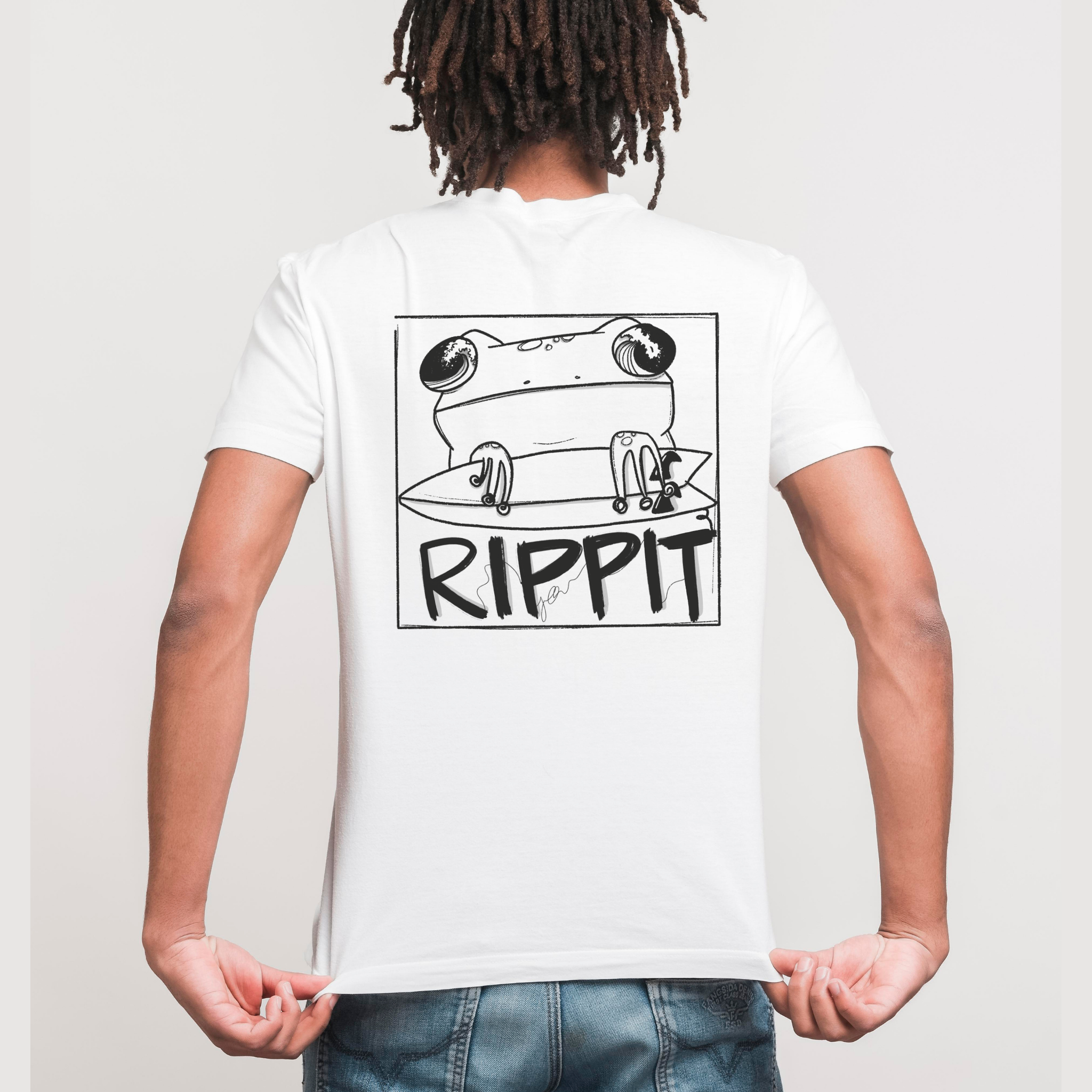 back view of a male model wearing a surf t-shirt that has a design of a frog holding a surfboard over text that says 'rippit'