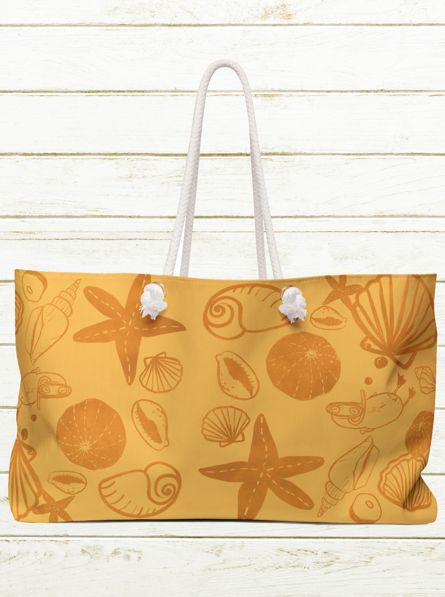 large beach bag with vintage orange print of sea shells and a surfjoy frog character diving 