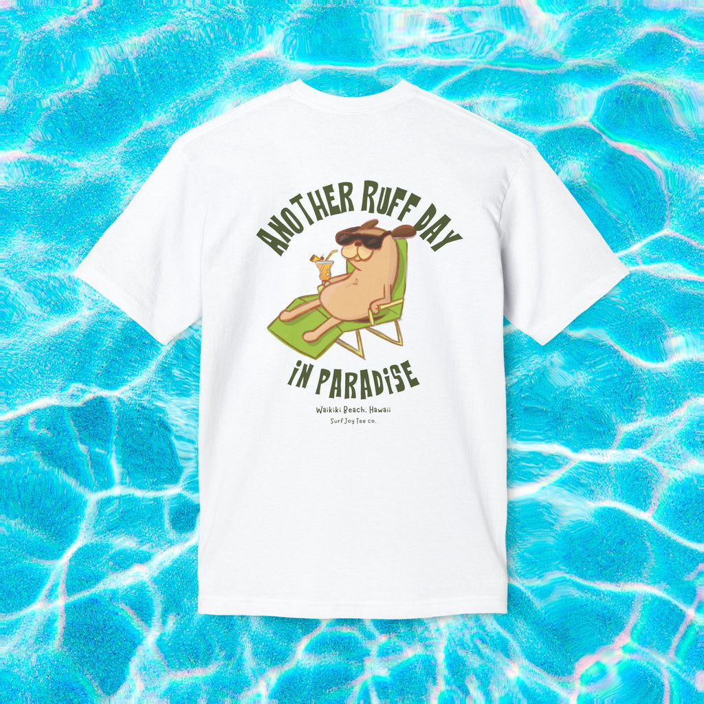a waikiki beach t-shirt featuring a dog in a beach chair with text thats says 'another ruff day in paradise'
